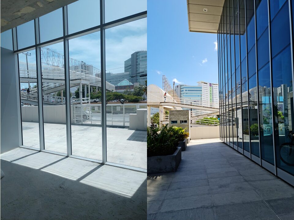 oficina en venta en cancún centro - vista desde interior del local hacia la calle y edificios al fondo